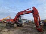 2003 O&K RH9.5 crawler excavator side view