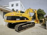 Caterpillar 320CL crawler excavator, rear three-quarter view