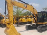 2026 Caterpillar 324 crawler excavator, side profile view
