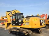 2023 Caterpillar 330D2 excavator, rear three-quarter view