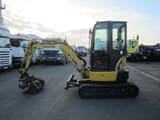 2013 Komatsu PC26MR-3 mini excavator, side view