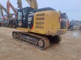 2018 Caterpillar 323F LN crawler excavator, rear three-quarter view