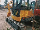 Komatsu PC40MR mini excavator, rear three-quarter view