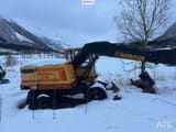 1991 Åkerman H7M wheel excavator, side profile view