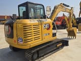 2022 Caterpillar 305.5E2 mini excavator, rear three-quarter view