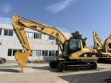 2011 Caterpillar 320CL crawler excavator, side profile view