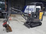 2015 Volvo EC15C mini excavator, side view
