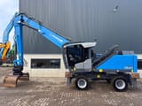 2022 Fuchs MHL331F material handler, side profile view