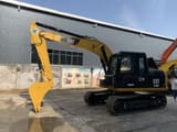 2022 Caterpillar 312D crawler excavator, side view