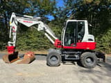 2015 Takeuchi TB295W wheel excavator side view
