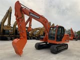 2021 Doosan DX140LC crawler excavator, side view