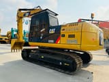 2023 Caterpillar 320D2 crawler excavator, rear three-quarter view