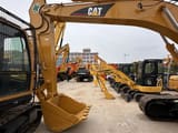2024 Caterpillar 320CL гусеничний екскаватор, боковий профіль