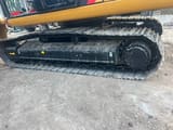 2024 Caterpillar 324D crawler excavator side view of tracks