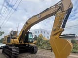 2024 Caterpillar 320GC crawler excavator, side profile view