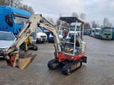 2009 Takeuchi TB014 mini excavator, front three-quarter view