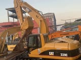 2018 Caterpillar 320C amphibious excavator, side view