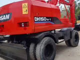 Doosan DH150W-7 wheel excavator, rear three-quarter view