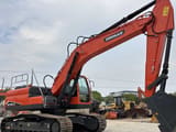2018 Doosan DX225LCA crawler excavator, side profile view