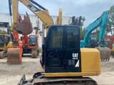 Caterpillar 305.5E mini excavator, side view