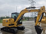 2022 Caterpillar 305.5E2 mini excavator, side view