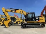 2023 Caterpillar 323DL crawler excavator, side profile view
