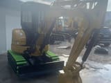 2020 Caterpillar 303E mini excavator, front three-quarter view