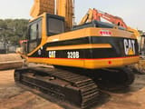 2023 Caterpillar 320B crawler excavator, rear three-quarter view