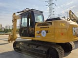2021 Caterpillar 315D2 crawler excavator, rear three-quarter view