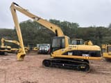 Caterpillar 320CL rupsgraafmachine uit 2018, zijaanzicht