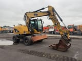 2008 Caterpillar M313D wheel excavator, side profile view
