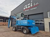 2010 Fuchs MHL454 material handler, side view