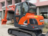 Doosan DX60-9C mini excavator, front three-quarter view
