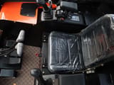 2024 Müller Machinery MB 25-VKSH Mini Excavator interior, showing the black operator's seat and control levers.