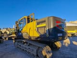 2015 Volvo EC220ENH crawler excavator, rear three-quarter view