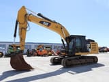 2014 Caterpillar 329ELN crawler excavator, side view