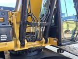 2015 Caterpillar 329ELN crawler excavator boom and cab detail
