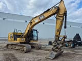 2018 Caterpillar 320GC crawler excavator, side view