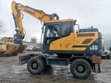 2016 Hyundai HW140 wheel excavator, side profile view