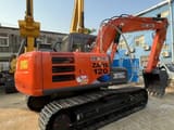 2016 Hitachi Zaxis 120 crawler excavator, rear three-quarter view