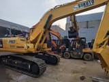 2023 Komatsu PC200 crawler excavator, side view