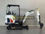 2025 Bobcat E19 Mini Excavator from a side view, showcasing the full length of the white boom and arm.