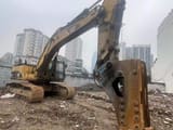2006 Caterpillar 345B crawler excavator with hydraulic breaker attachment