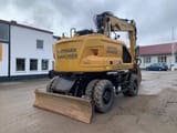 2023 Caterpillar M317-07B wheel excavator, rear three-quarter view