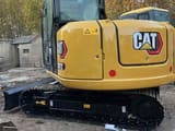 2023 Caterpillar 307E2 crawler excavator rear three-quarter view