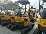 2022 XCMG XE17U Crawler Excavator showing the rear of the machine with its black undercarriage and yellow body.