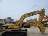 1998 Caterpillar 320BL crawler excavator, side profile view