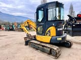 2016 Komatsu PC35MR-3 mini excavator, front three-quarter view