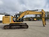 2012 Caterpillar 320E crawler excavator, side view