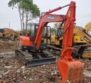 Doosan DH55 crawler excavator, front three-quarter view